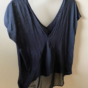 Black shirt with pocket in front and fun back!